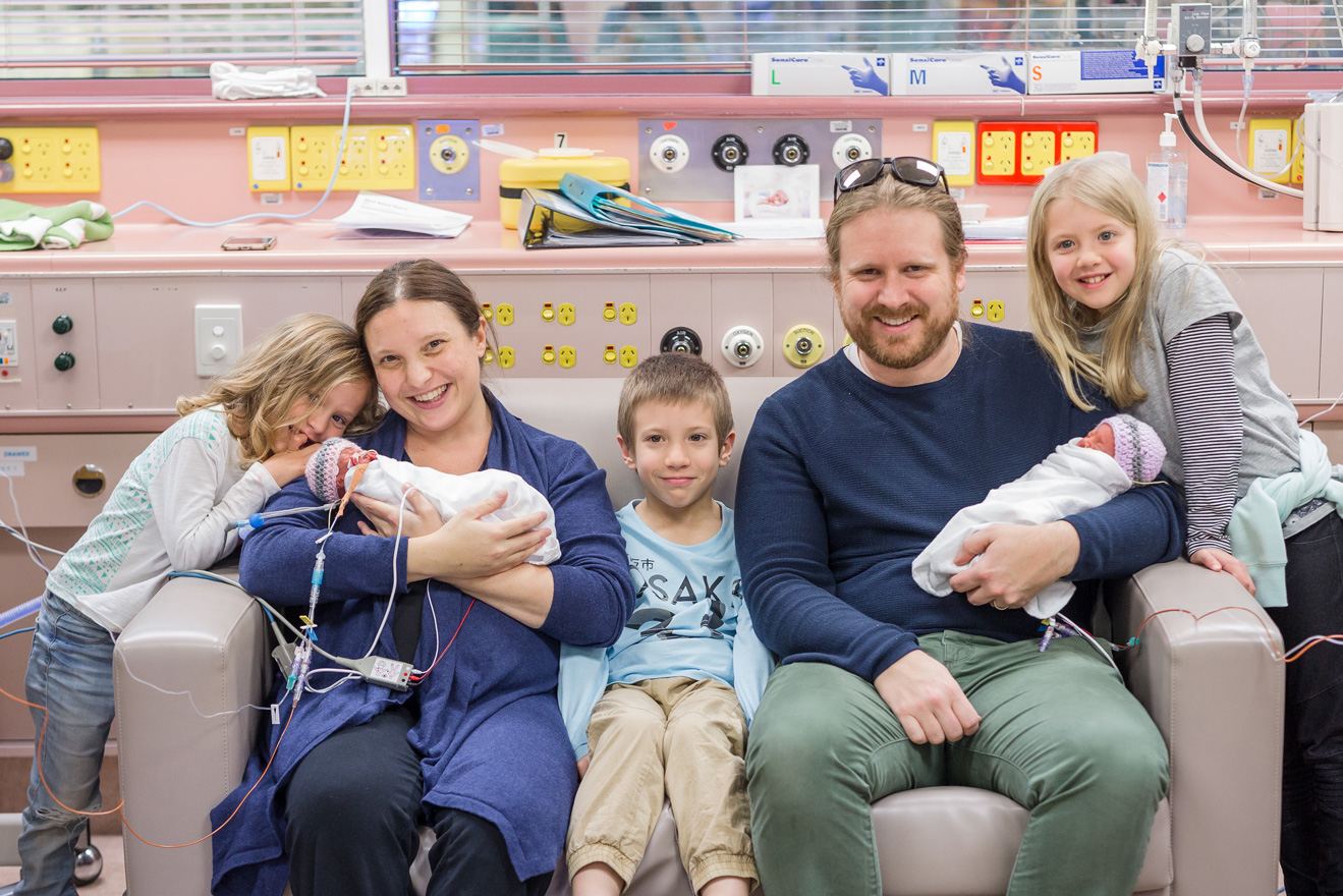 The Fleming family pictured as a family of seven in the Women's and Children's Hospital Neonatal Intensive Care Unit. 