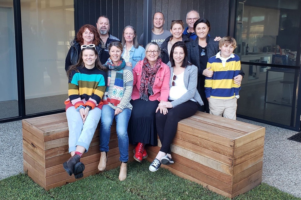 The Beach House founding families visiting the completed Beach House for the first time in 2019, including Cheryl Minniss (top, far left). 