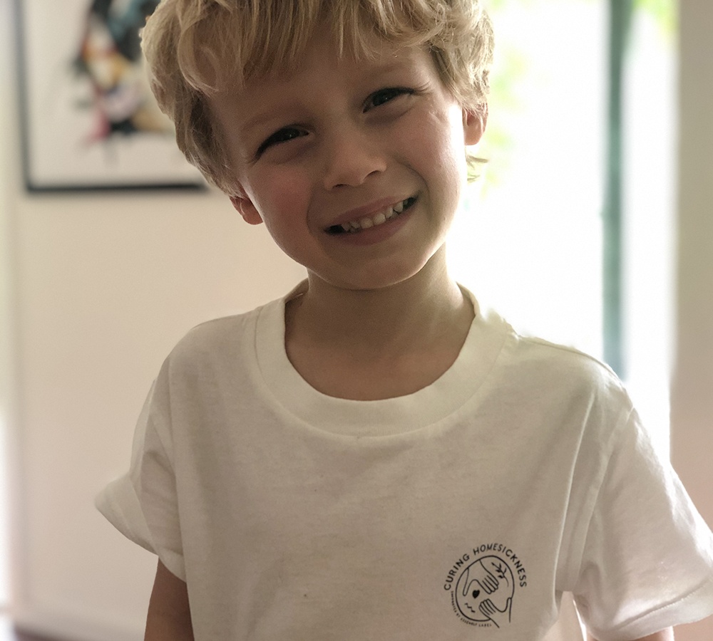 Young boy smiling.