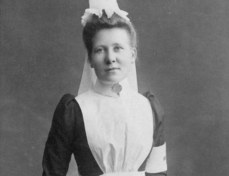 Kate Hill, the original nurse trainer, photographed in the traditional nursing uniform