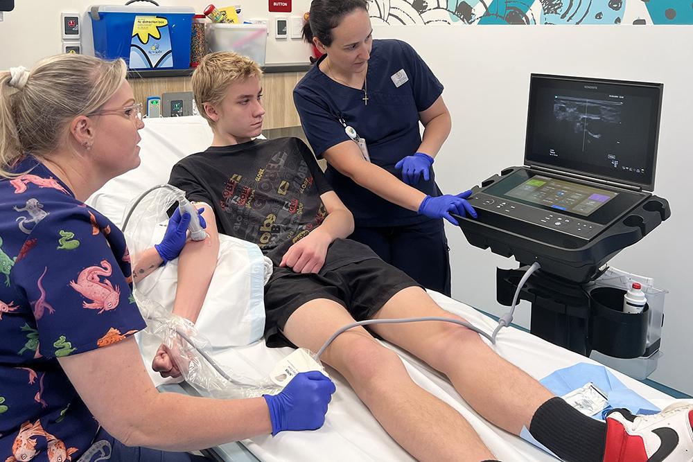 The new IV ultrasound being used on patient, Leo, in the Medical Day Unit. 