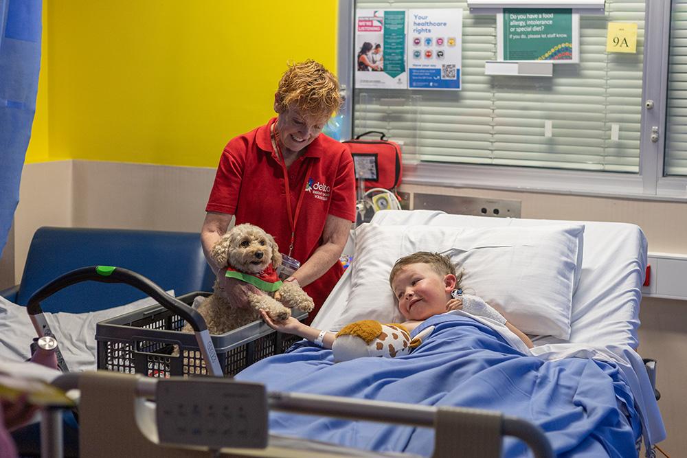 Cathie and Winnie with patient, Cameron. 