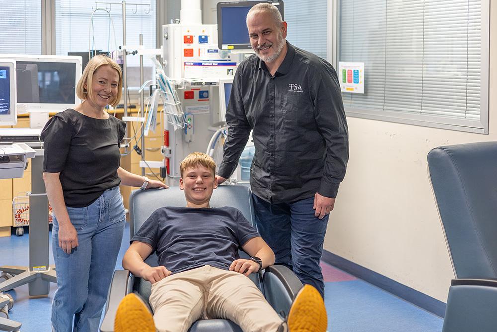 Meagan, Harry and Ben with one of the new recliner chairs in PICU. 