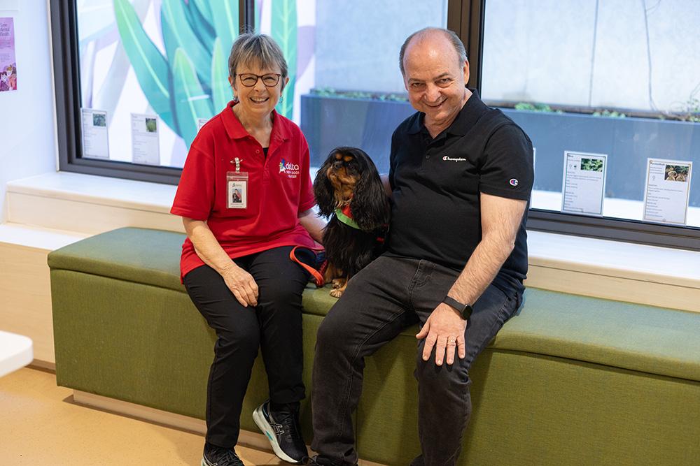 Sandra and Trixie with Mario Corena. Delta Therapy Dogs. 